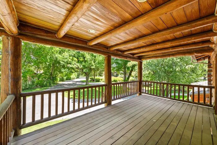 Covered timber deck overlooking the grounds