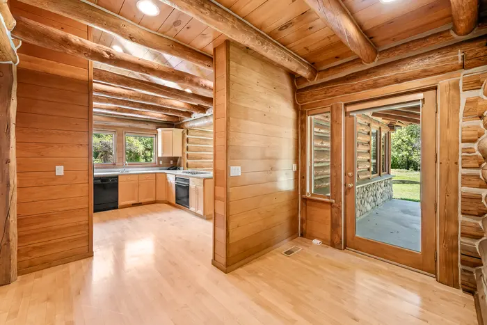 Cabin dining area opening to the kitchen