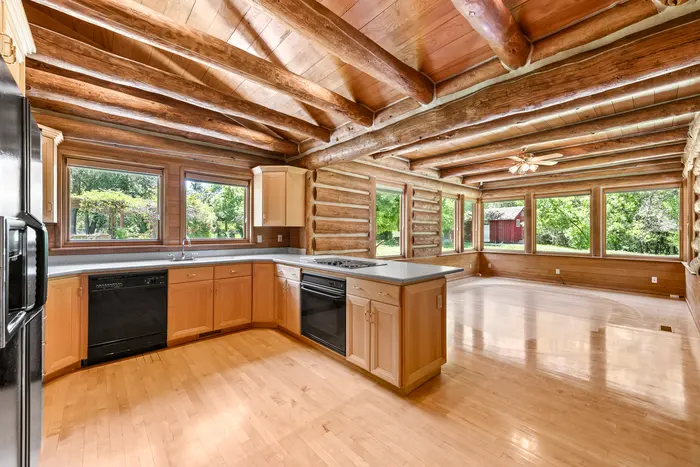 Fabian Cabin kitchen with broad garden windows