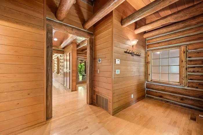 Timber-lined cabin hallway