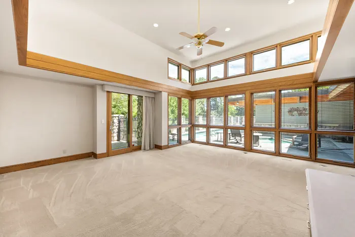 Window-lined room overlooking the grounds