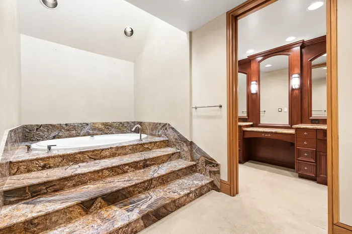 Stone-lined bath and vanity