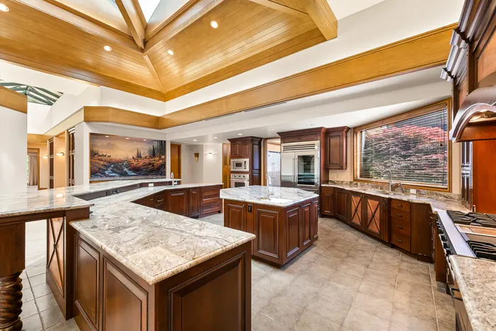 Main kitchen with stone-topped islands