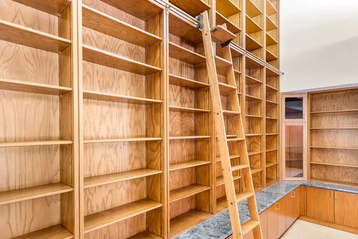 Library with floor-to-ceiling shelving