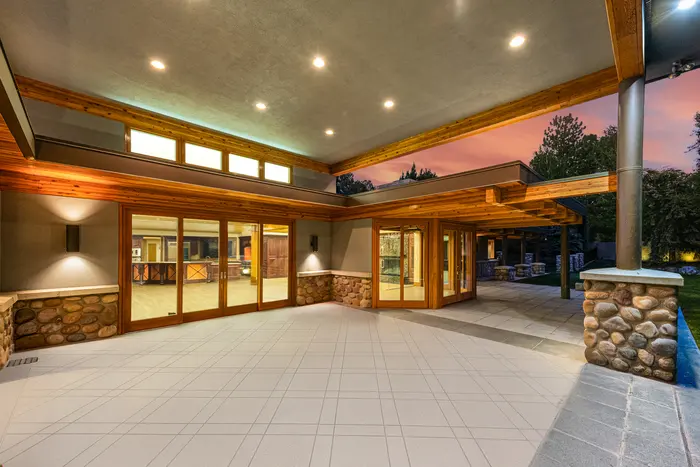 Covered outdoor living area at twilight