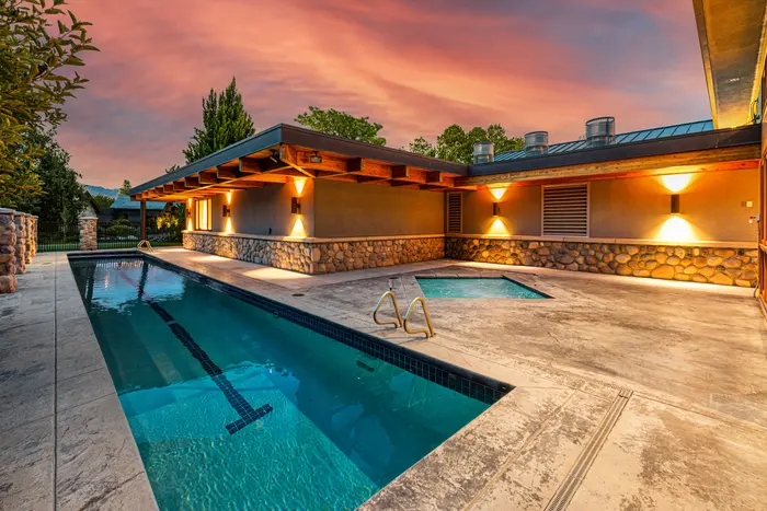 Illuminated lap pool at twilight