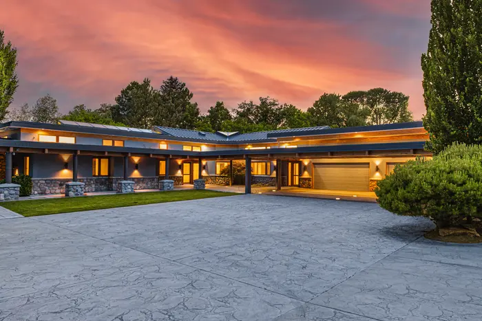 Main residence and motor court at twilight