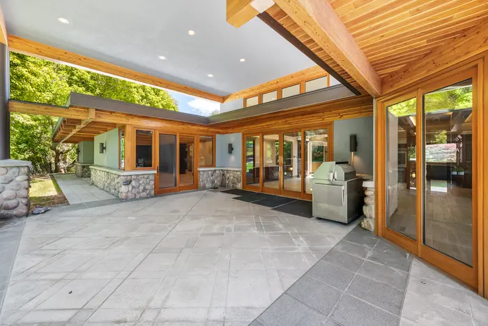 Covered patio opening to the pool